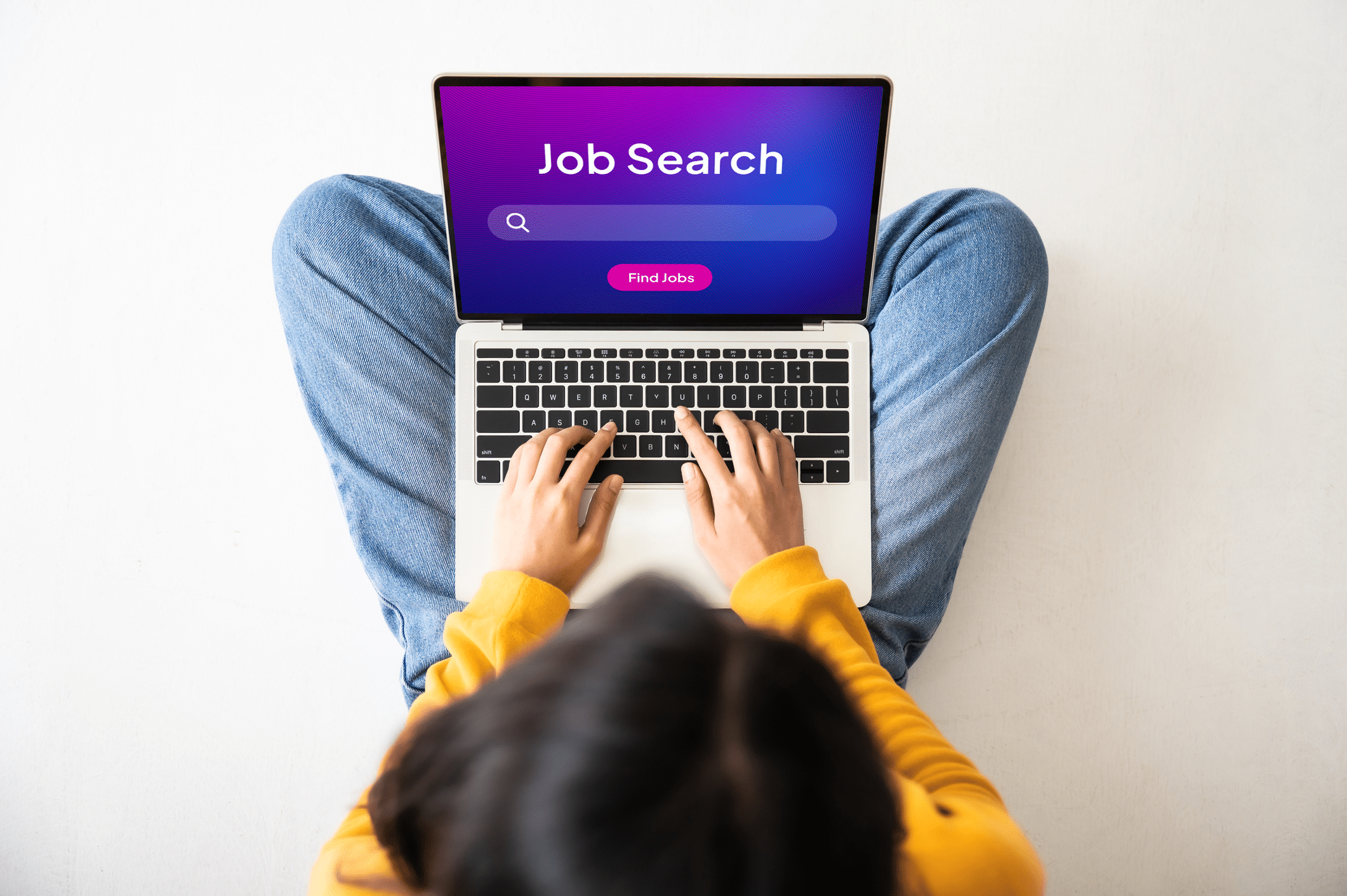 A female looking for jobs on her laptop