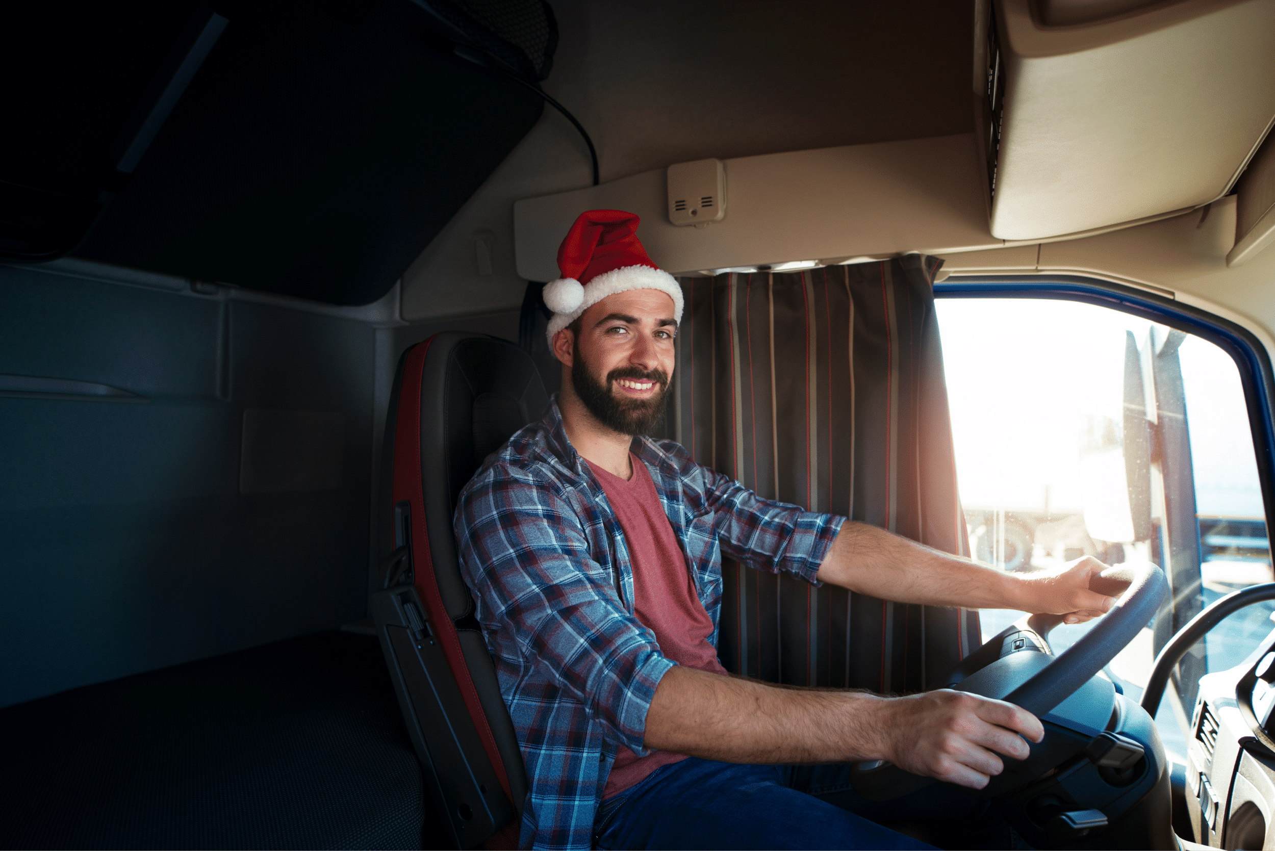 Van driver in a Christmas hat